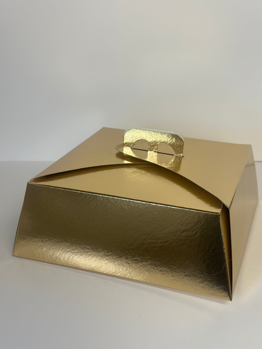 caja tarta trapezoidal en oro para tartas 